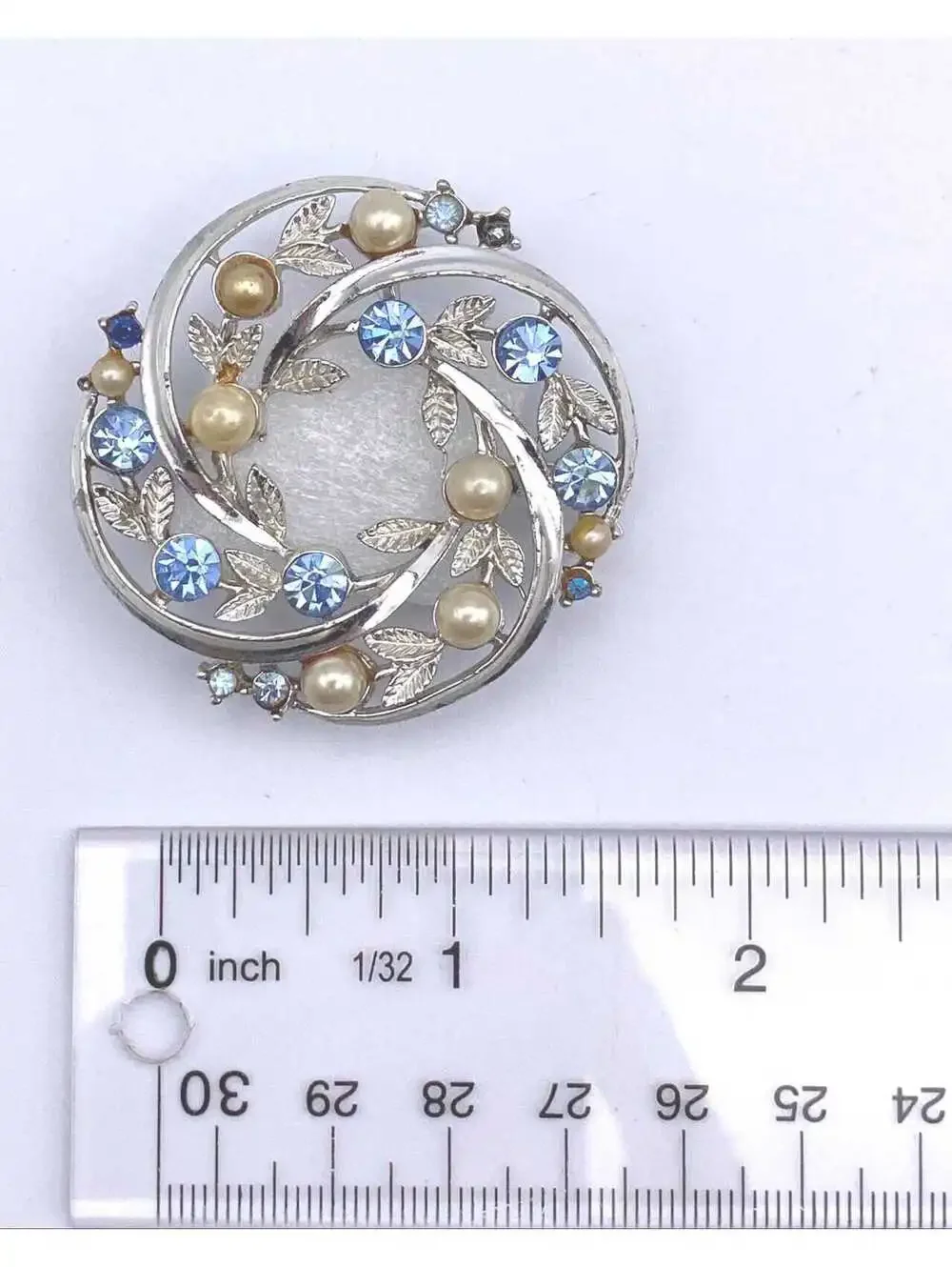 Vintage LISNER Silver Tone, Blue Rhinestones and Faux Pearl Wreath Brooch.